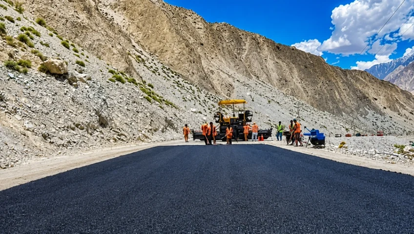 Road paving and bridge works in Gilgit-Baltistan mountains using cement supplied by Ammad Trading